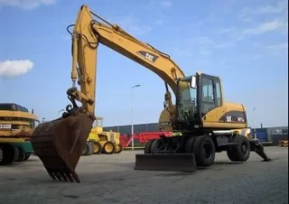 Колесный экскаватор Caterpillar 316
