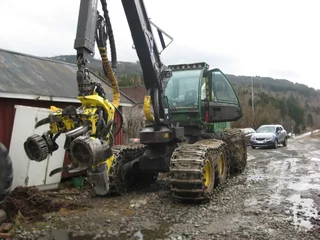 Харвестер гусеничный  John Deere 1070Е