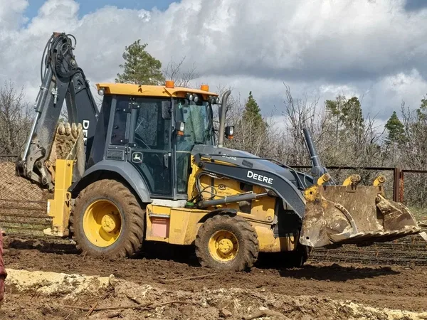 Экскаватор-погрузчик John Deere 315SL